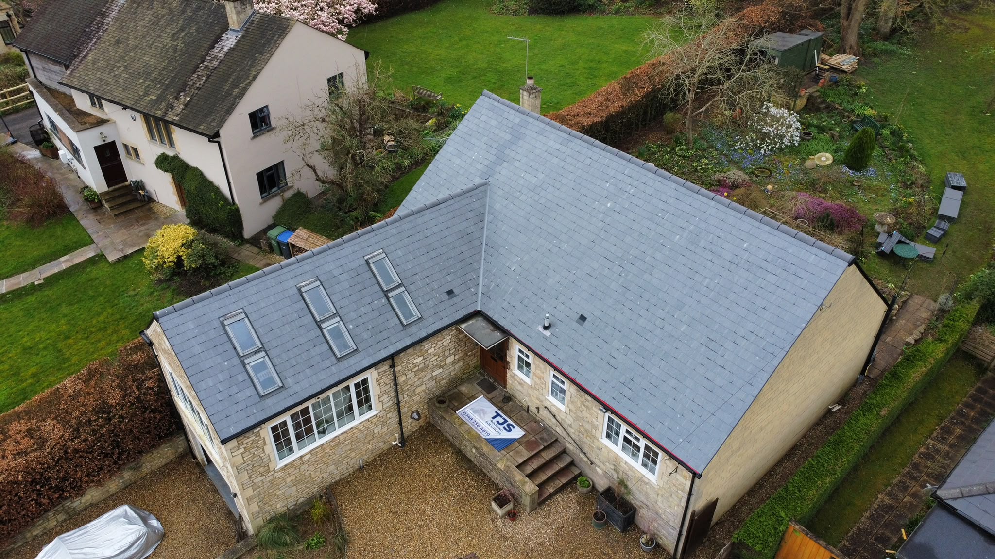 A roofing project with roof windows from TJS Roofing Solutions